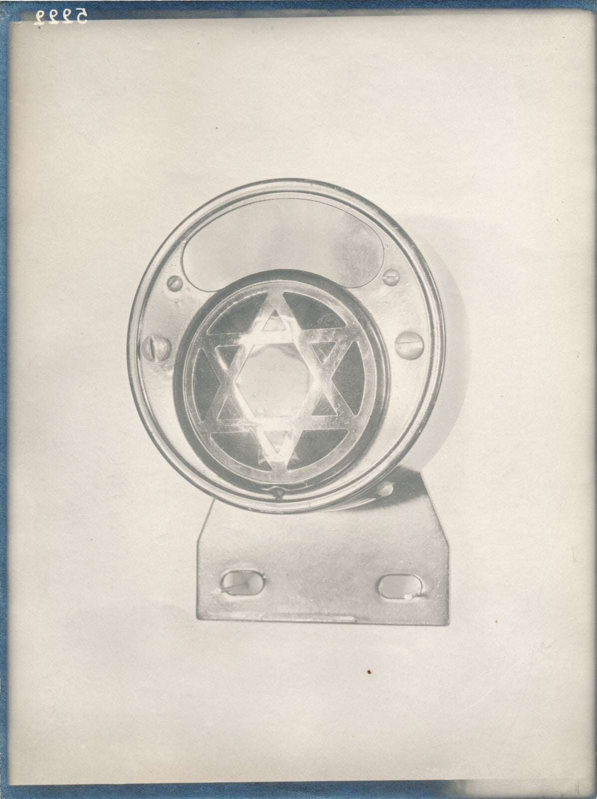 Objet non identifié étoile à six branches photo photographie publicité v. 1930