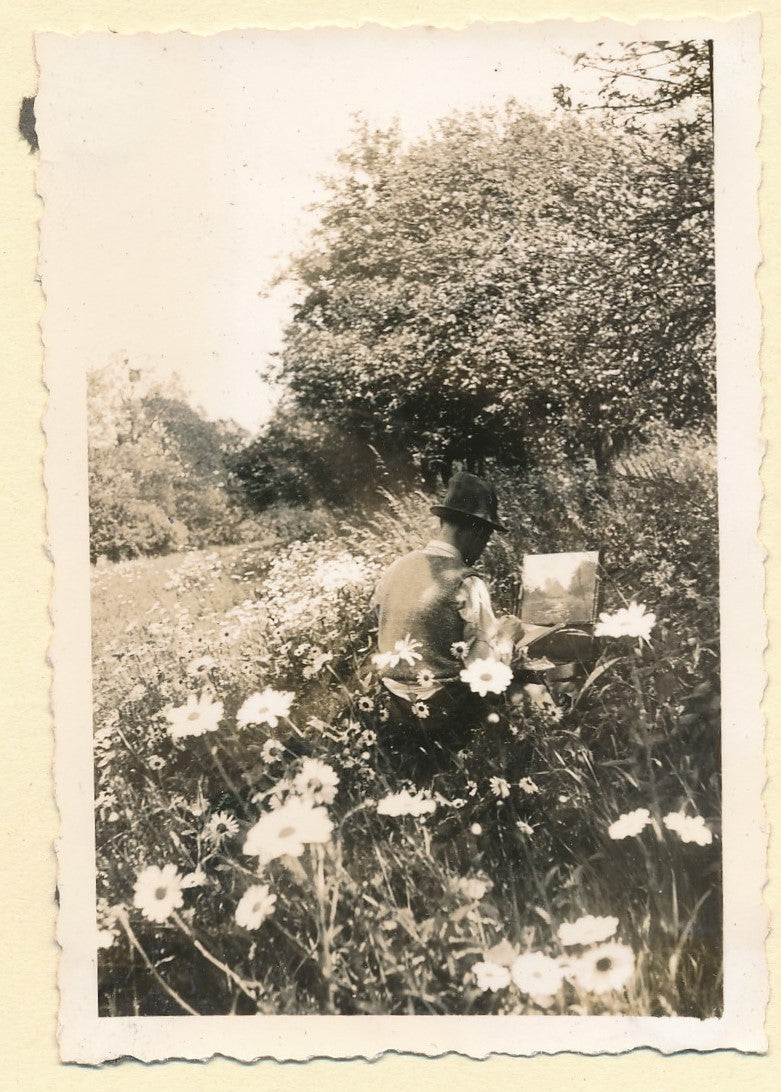 le peintre à son chevalet dans les fleurs snapshot photo photographie